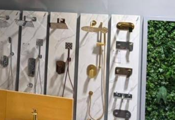 Gold, gun metal and bronze finish showers and concealed mixers on display at the Elite Aqua showroom